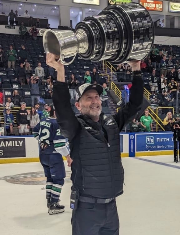 John Pierce holding ECHL champinoship trophy